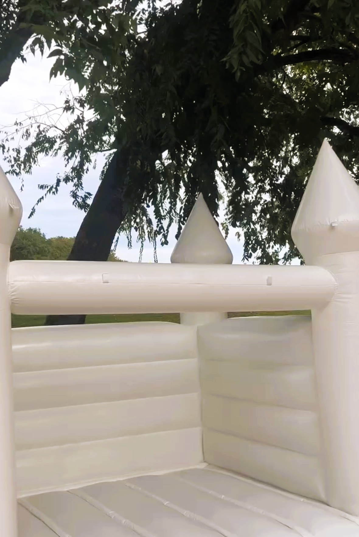 Modern white kiddie bouncy house rental
